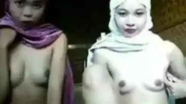 Dua ABG Berjilbab Pamer Memek Dan Toket poster